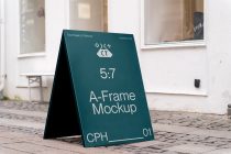Teal 5:7 ratio A-Frame sign positioned outside modern white building facade